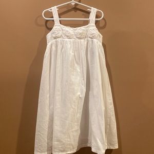 Mini Boden white dress with rosettes.  Girls size 7/8